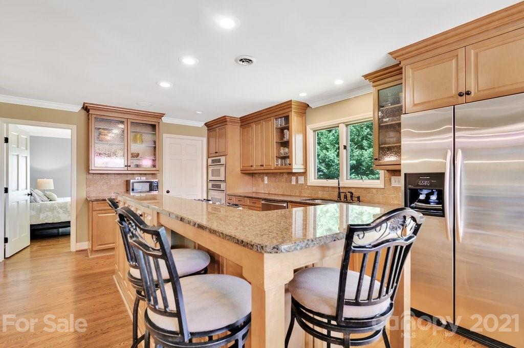 16123 Tana Tea Circle Tega Cay, SC 29708 - Photo 24 of 42 a dining room with furniture and window