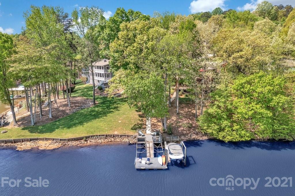 16123 Tana Tea Circle Tega Cay, SC 29708 - Photo 4 of 42 a view of a lake with a tree