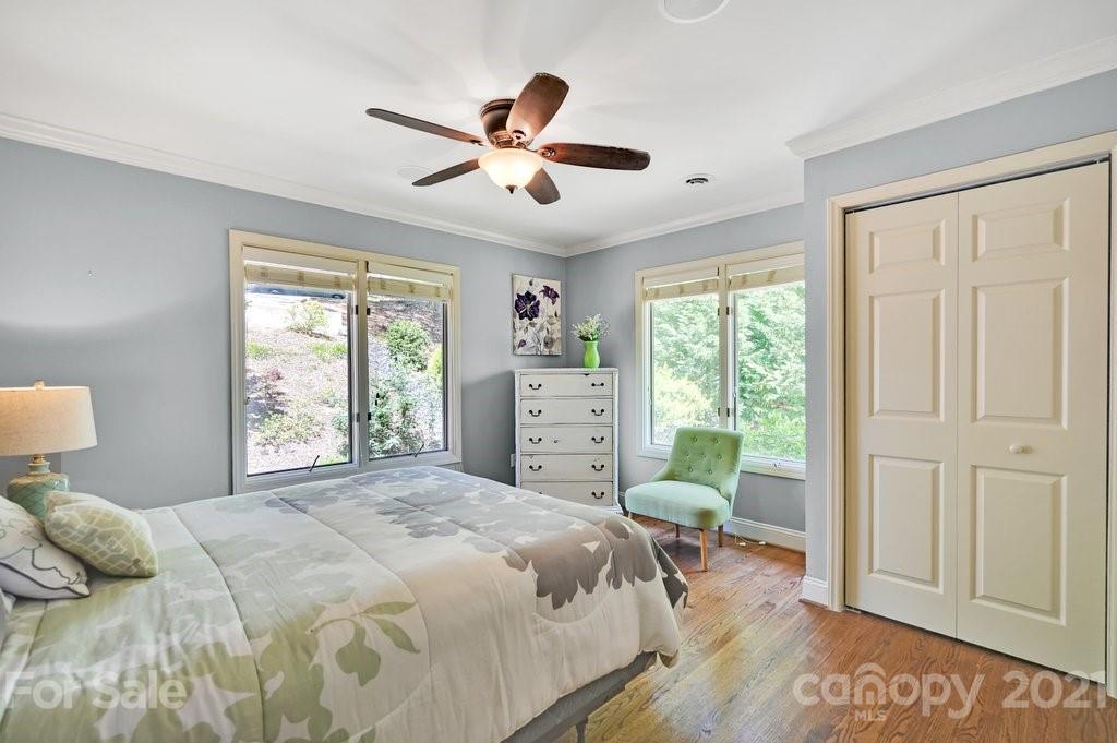 16123 Tana Tea Circle Tega Cay, SC 29708 - Photo 33 of 42 a bedroom with a bed and a large window