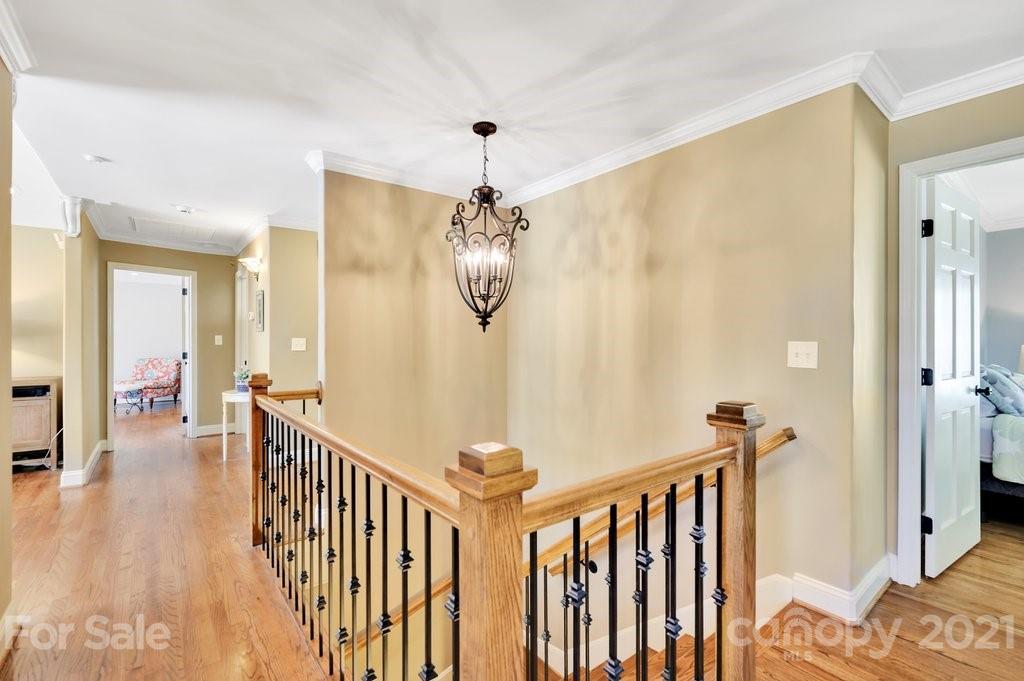 16123 Tana Tea Circle Tega Cay, SC 29708 - Photo 35 of 42 a view of a hallway view with staircase