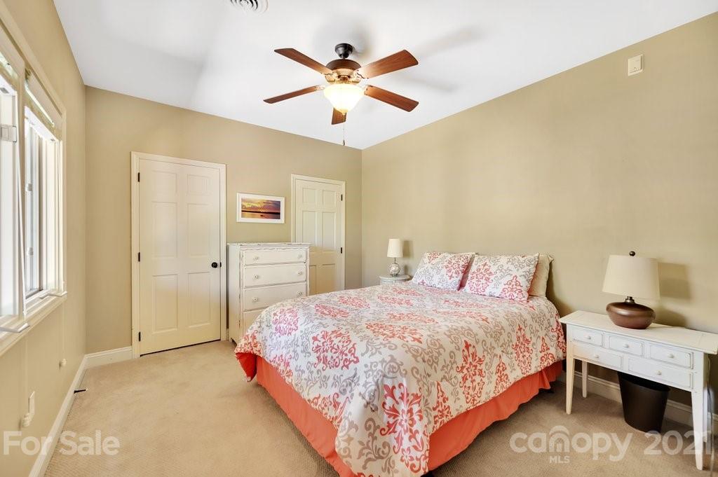 16123 Tana Tea Circle Tega Cay, SC 29708 - Photo 39 of 42 a bedroom with a bed and window
