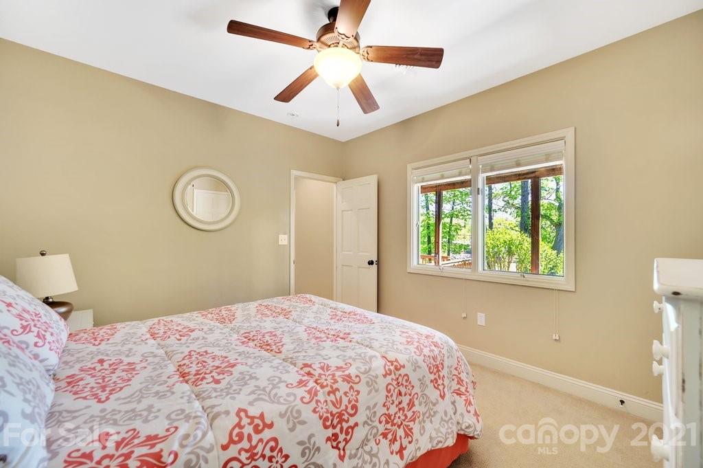 16123 Tana Tea Circle Tega Cay, SC 29708 - Photo 40 of 42 a bedroom with a bed and a window