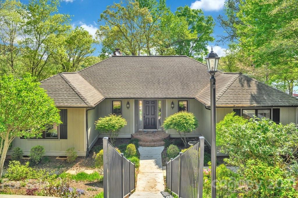 16123 Tana Tea Circle Tega Cay, SC 29708 - Photo 6 of 42 a house view with a garden space