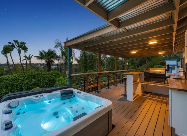 a bathroom with a tub and shower