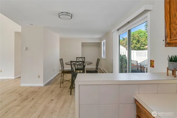 a living room with furniture and windows