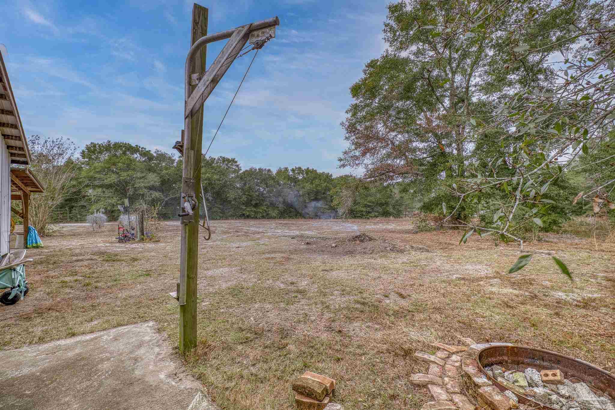 10246 Nichols Lake Road Milton, FL 32583 - Photo 33 of 43 a view of a yard