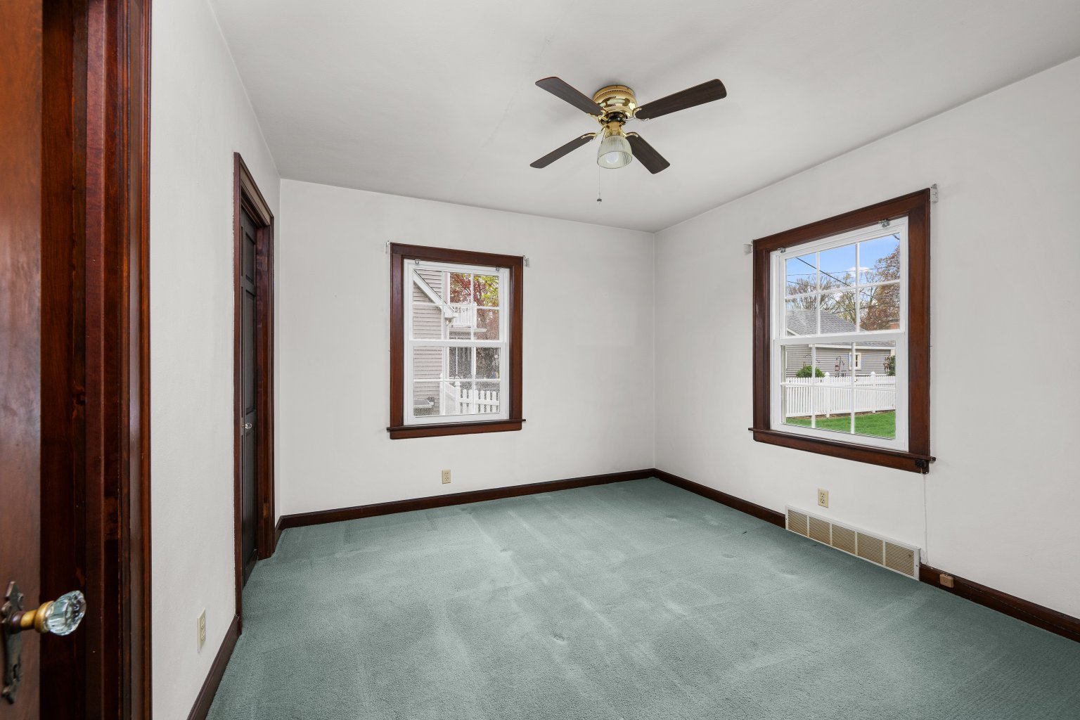 925 24th Street Moline, IL 61265 - Photo 15 of 37 an empty room with windows and ceiling fan
