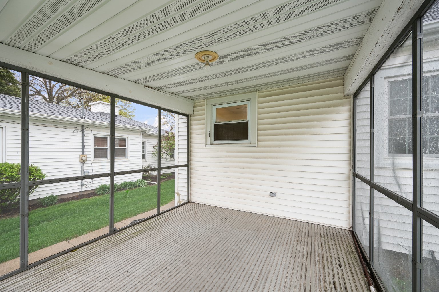 925 24th Street Moline, IL 61265 - Photo 33 of 37 a view of a porch with wooden floor