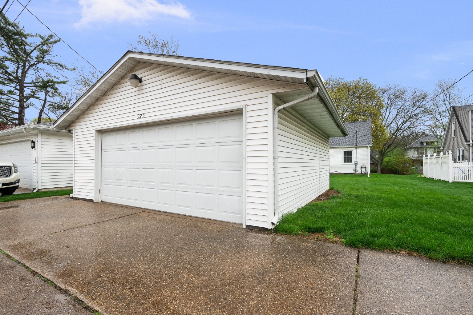 925 24th Street Moline, IL 61265 - Photo 37 of 37 a front view of a house with a yard and garage