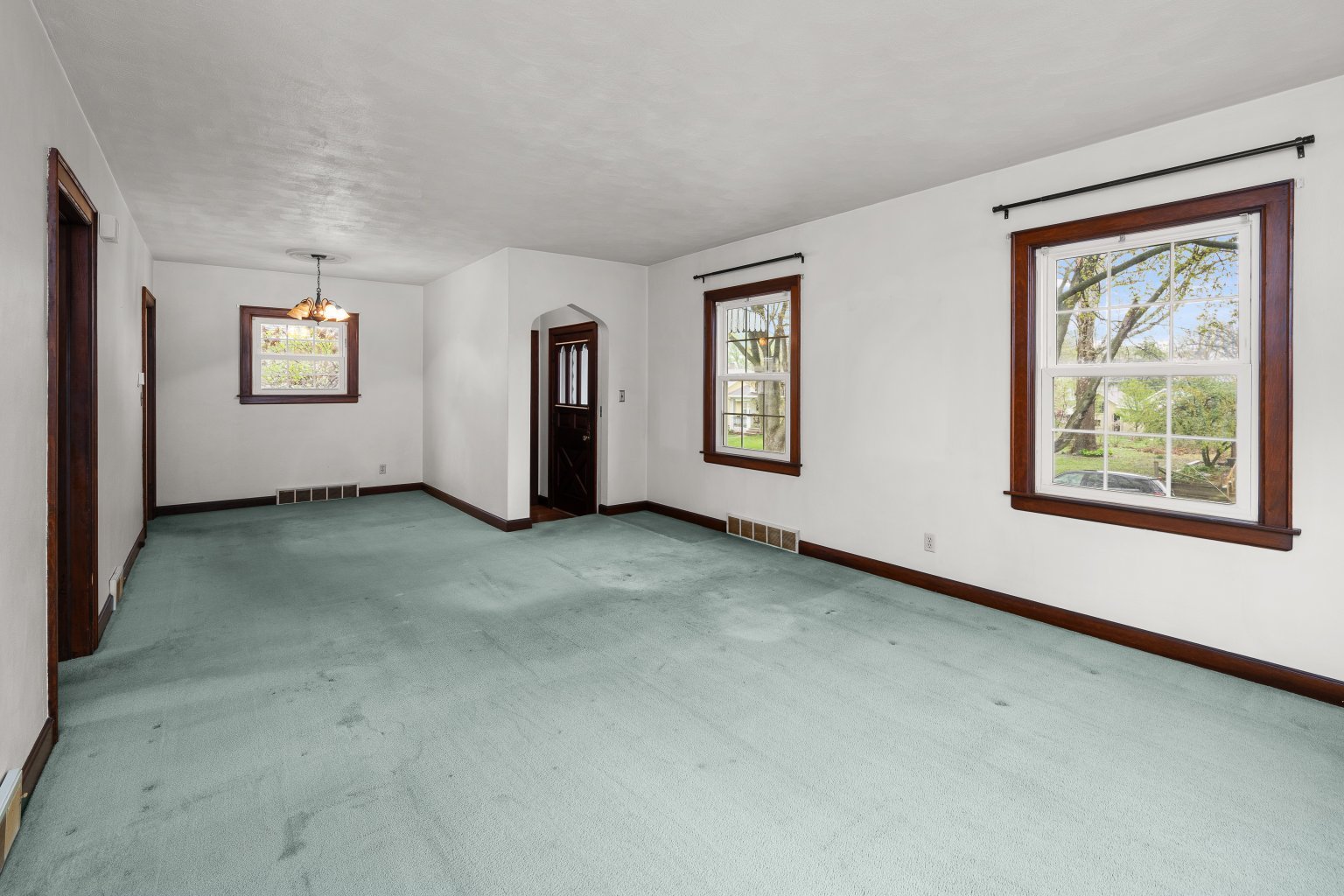 925 24th Street Moline, IL 61265 - Photo 4 of 37 a view of an empty room with window