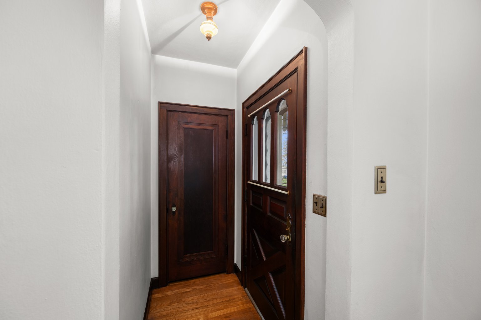925 24th Street Moline, IL 61265 - Photo 6 of 37 a view of hallway with sink and wooden floor