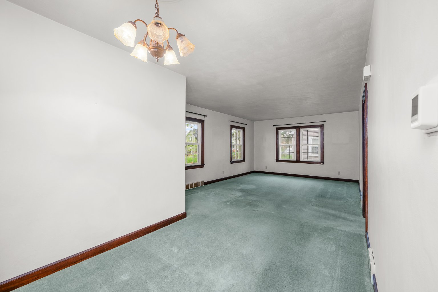 925 24th Street Moline, IL 61265 - Photo 10 of 37 a view of a livingroom with a chandelier fan