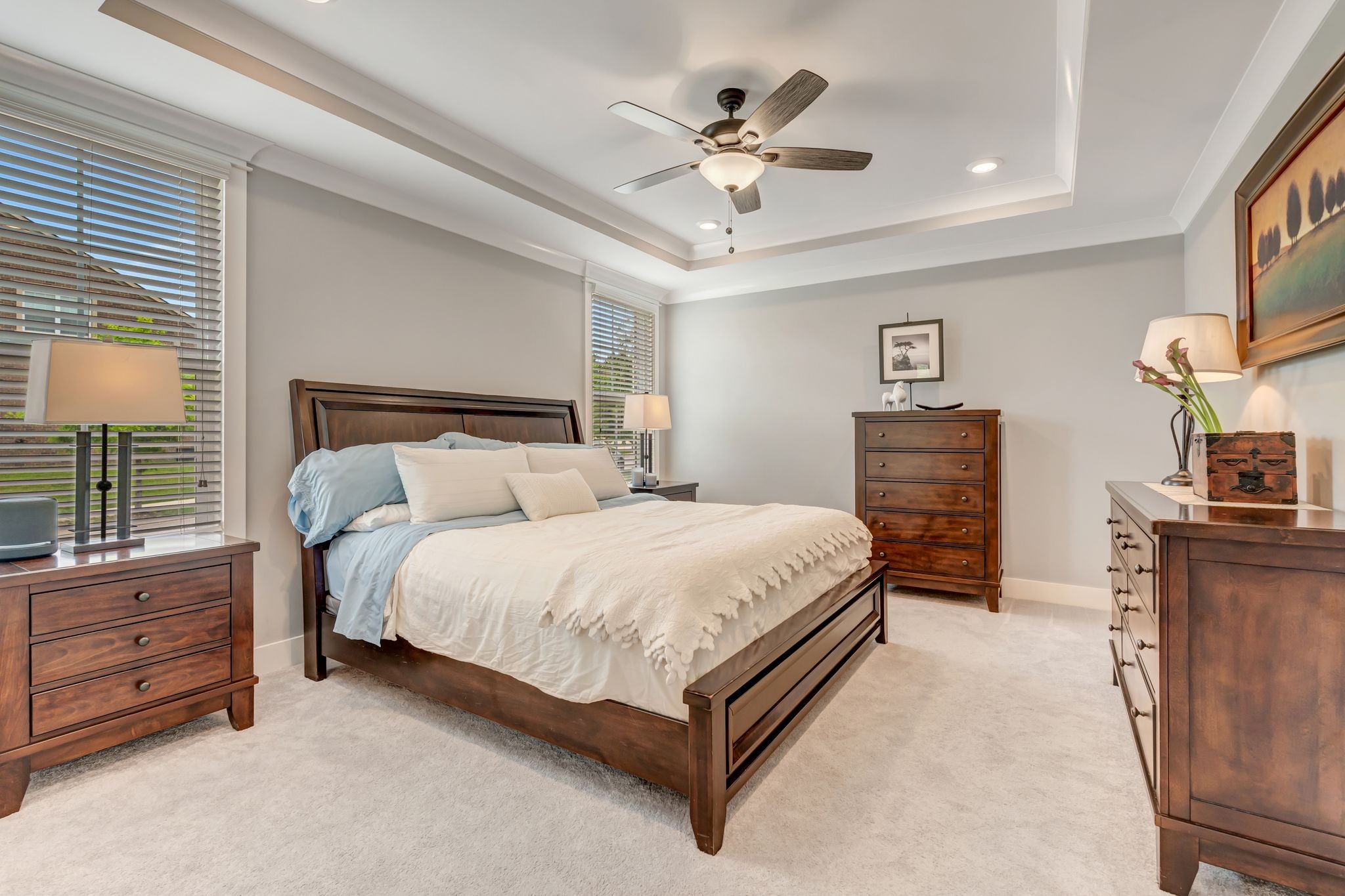 607 Beamon Drive Franklin, TN 37064 - Photo 11 of 45 a spacious bedroom with a bed and a chandelier