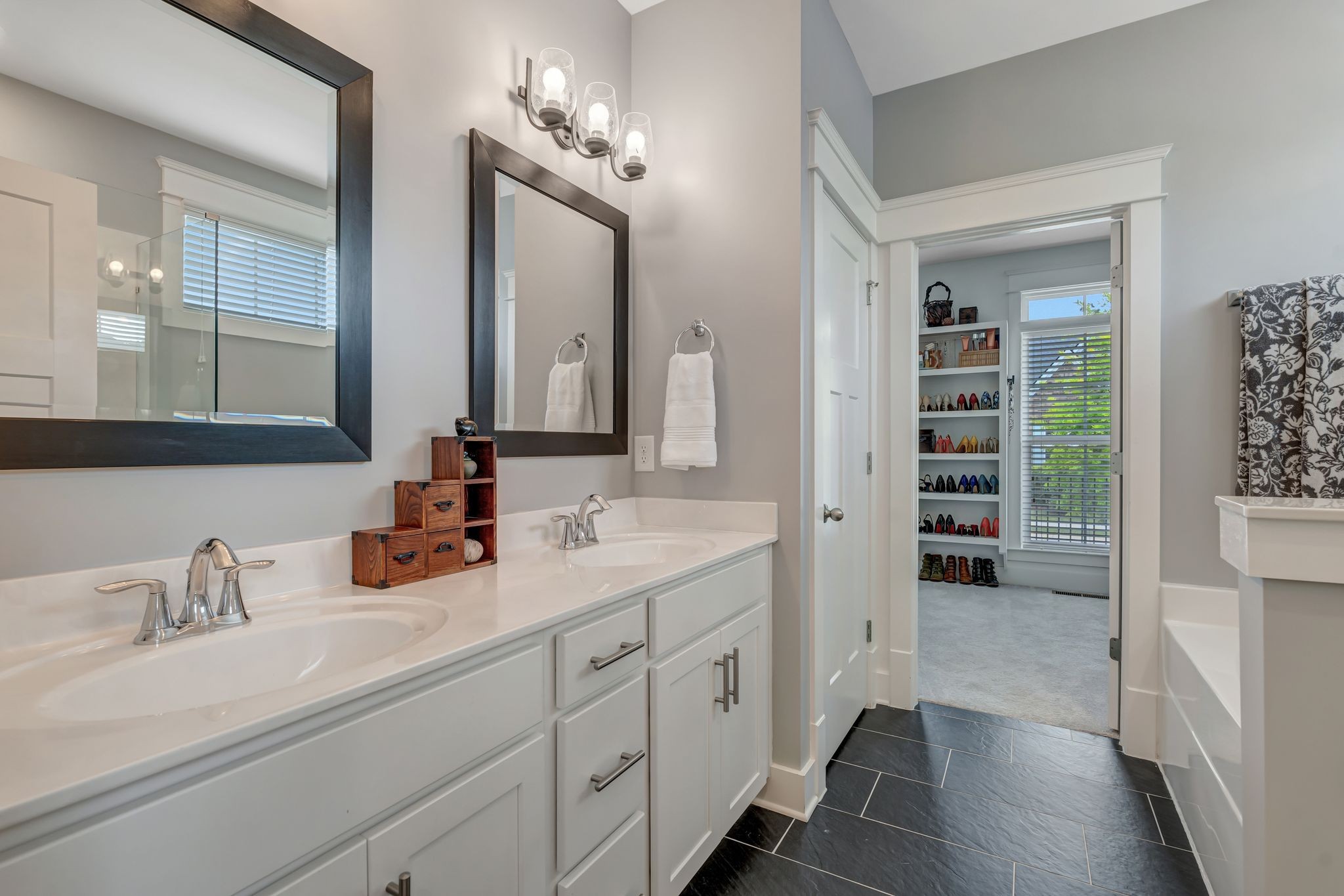 607 Beamon Drive Franklin, TN 37064 - Photo 13 of 45 a en suite bathroom with double sink and a large mirror