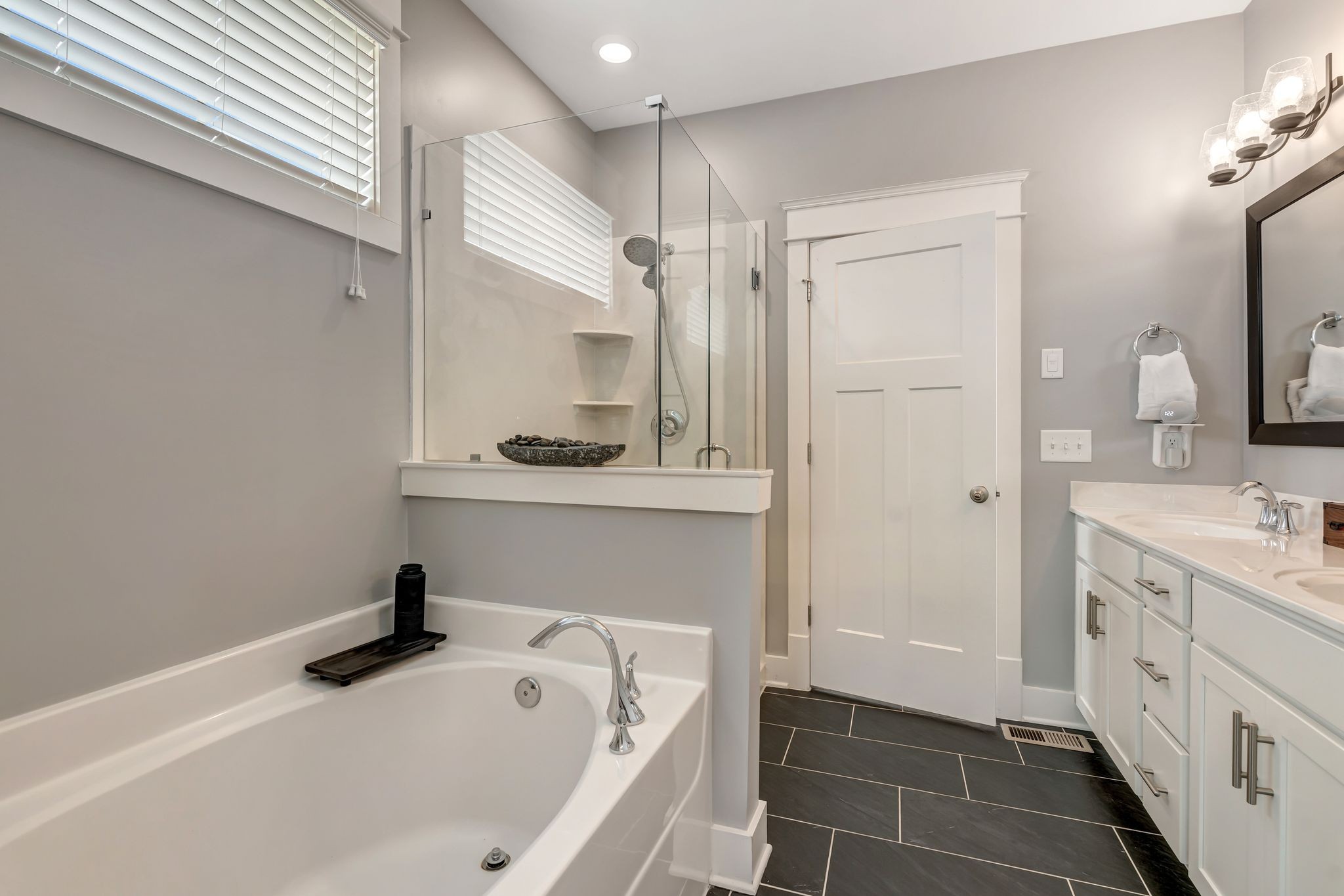 607 Beamon Drive Franklin, TN 37064 - Photo 15 of 45 a bathroom with a tub sink and mirror