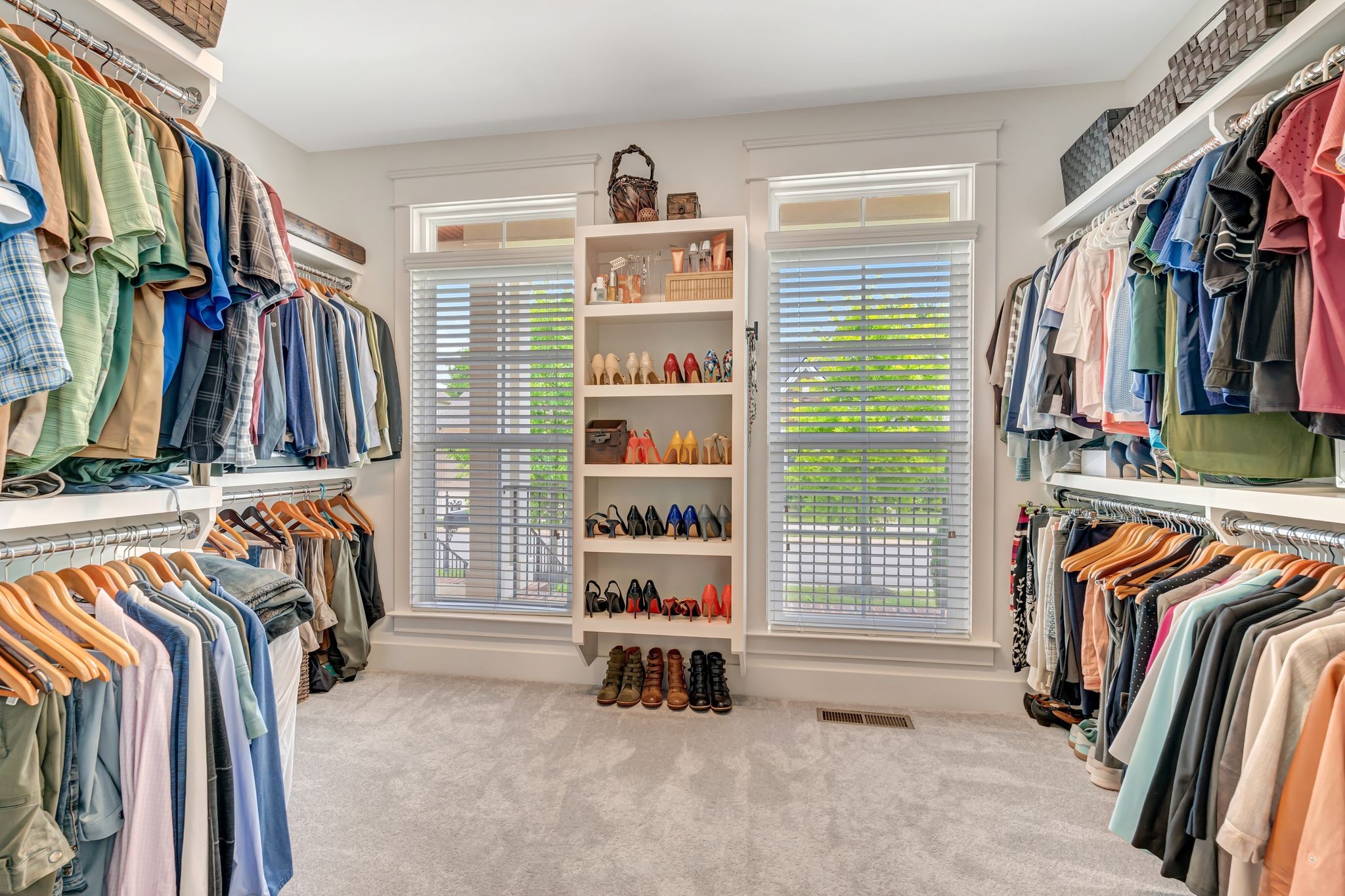 607 Beamon Drive Franklin, TN 37064 - Photo 16 of 45 a view of walk in closet with clothes and shoes