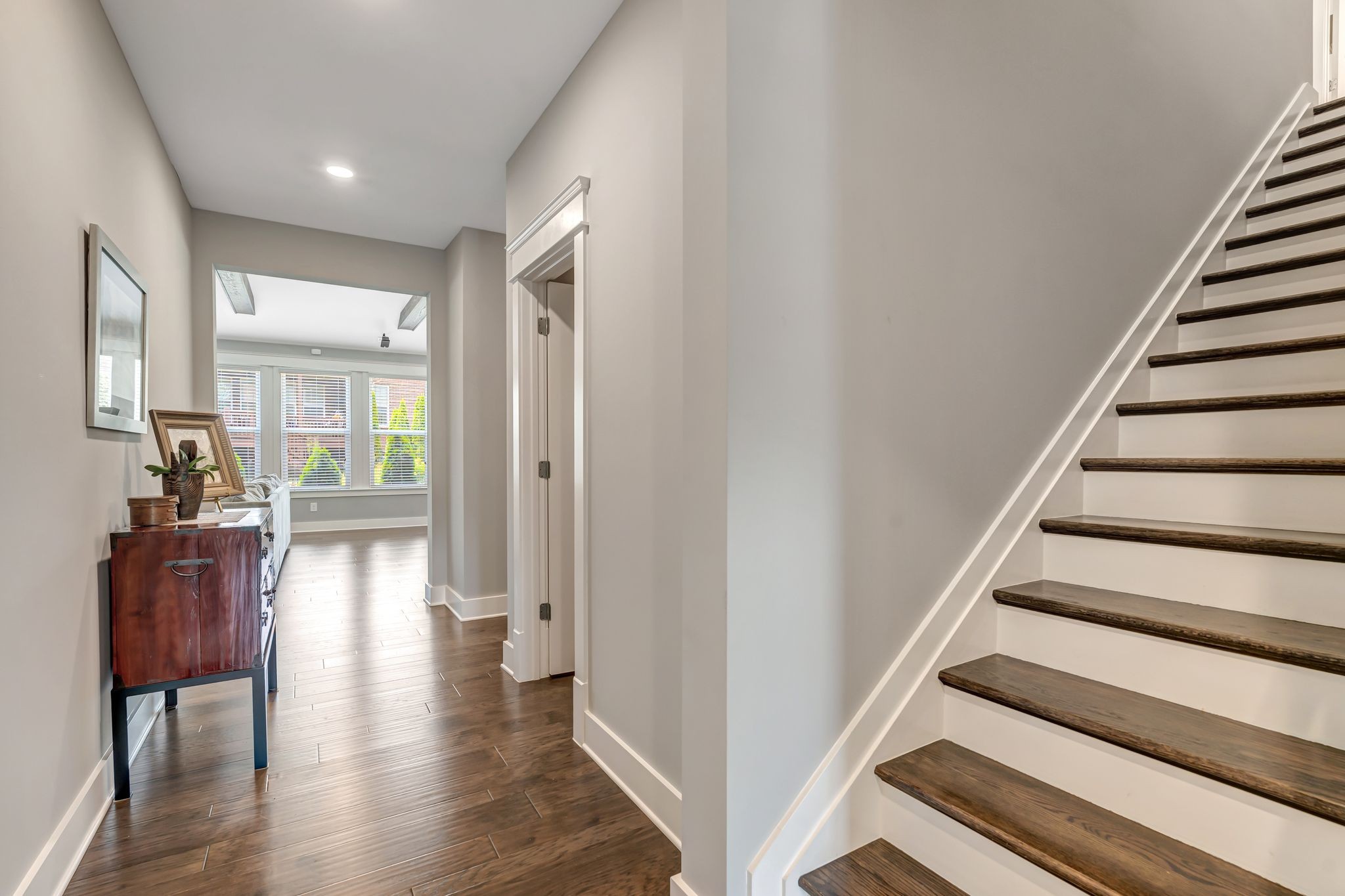 607 Beamon Drive Franklin, TN 37064 - Photo 17 of 45 a view of a hallway with wooden floor and windows
