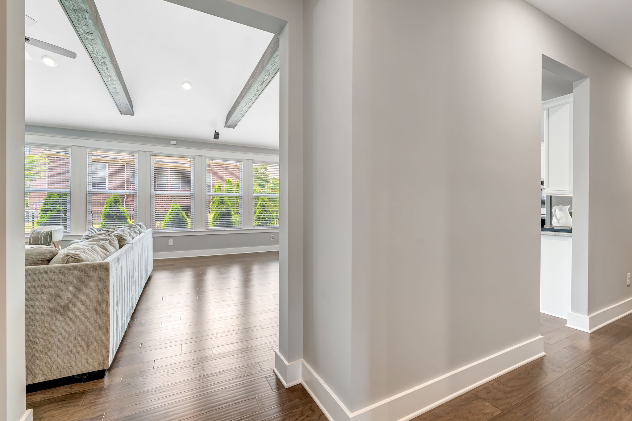 607 Beamon Drive Franklin, TN 37064 - Photo 19 of 45 a view of a hallway with wooden floor and furniture