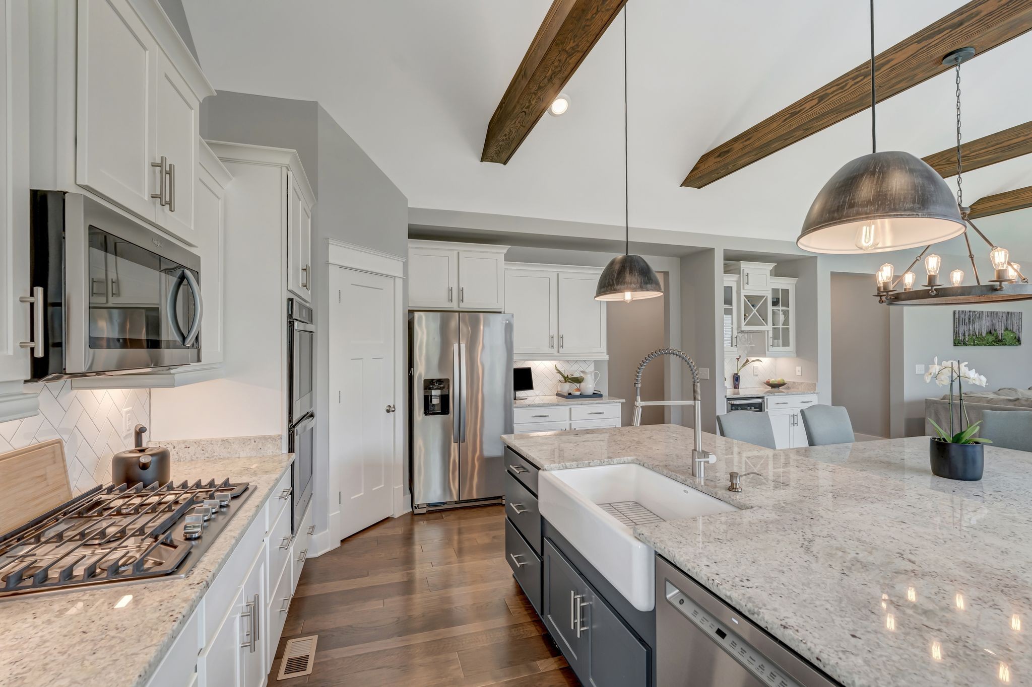 607 Beamon Drive Franklin, TN 37064 - Photo 28 of 45 a kitchen with stainless steel appliances granite countertop a sink a stove and a refrigerator