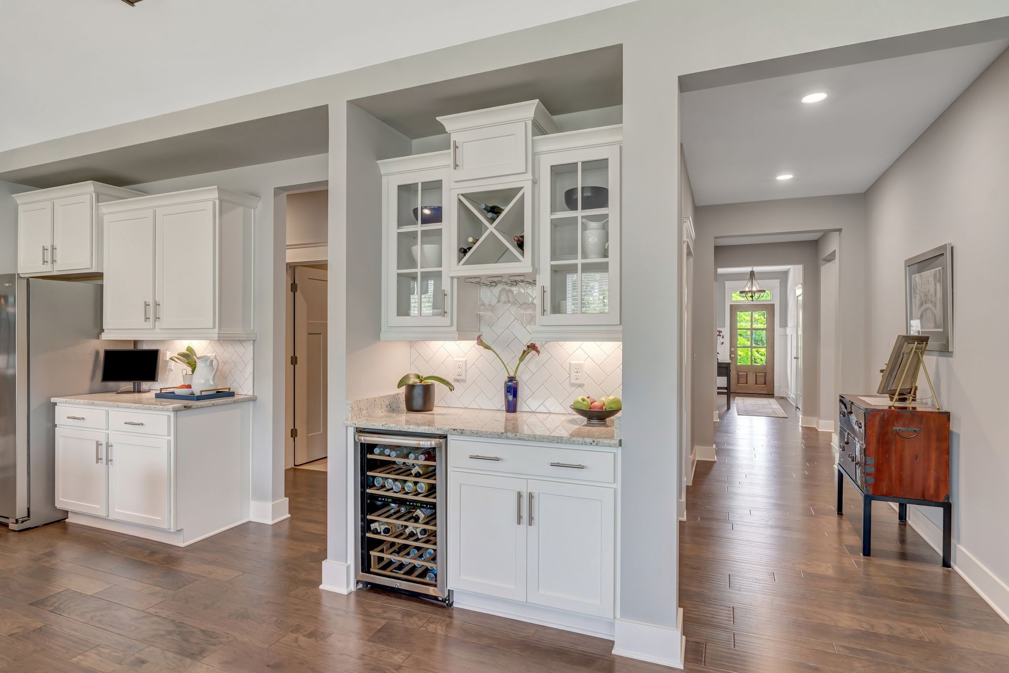 607 Beamon Drive Franklin, TN 37064 - Photo 31 of 45 a kitchen with white cabinets and wooden floor