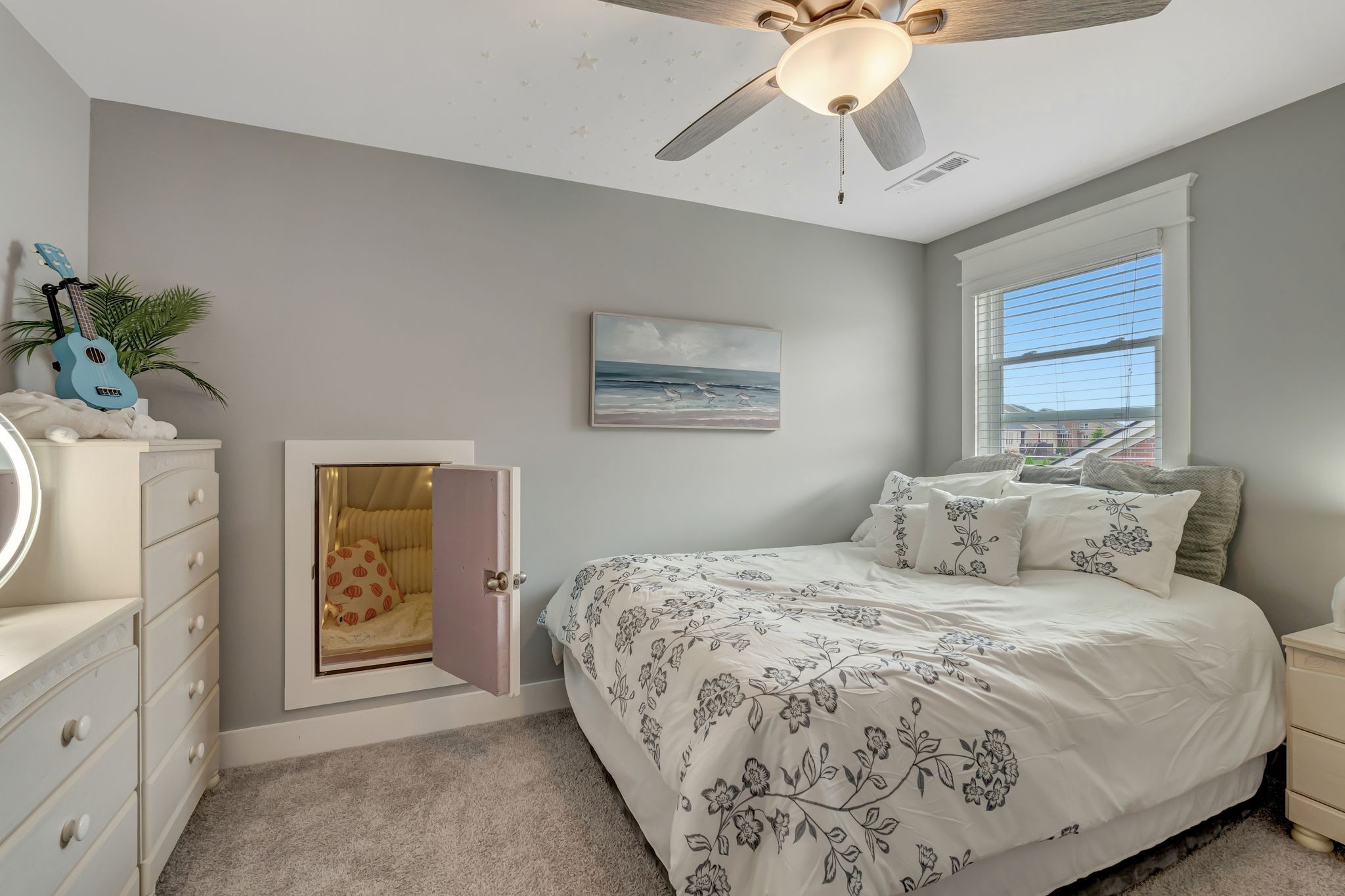 607 Beamon Drive Franklin, TN 37064 - Photo 36 of 45 a bedroom with a bed and a chandelier