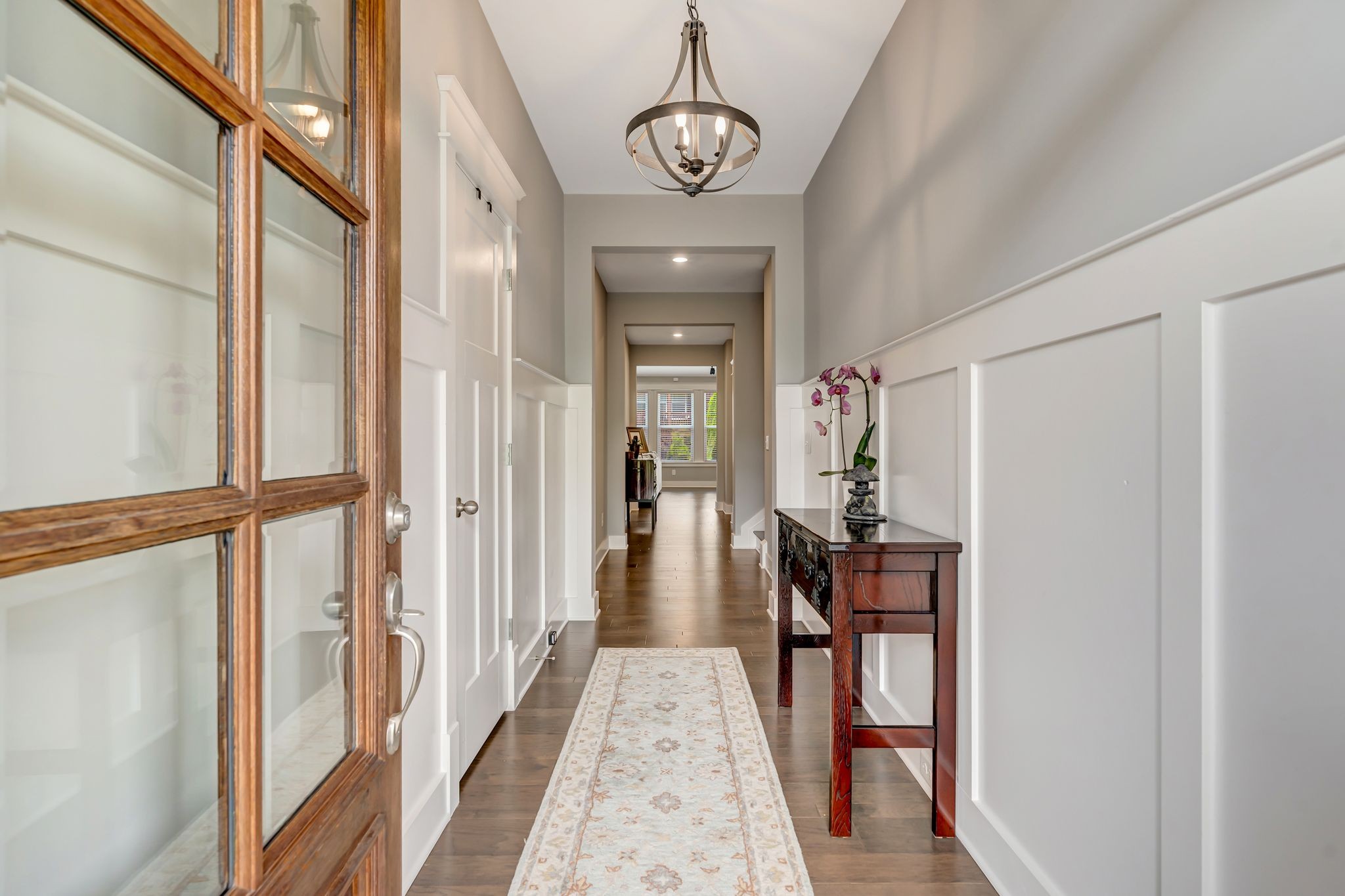 607 Beamon Drive Franklin, TN 37064 - Photo 6 of 45 a view of a hallway view with wooden floor and staircase