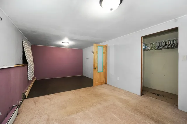 a kitchen with sink refrigerator and stove