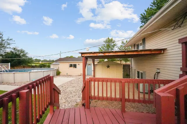 a view of deck with wooden floor and stairs
