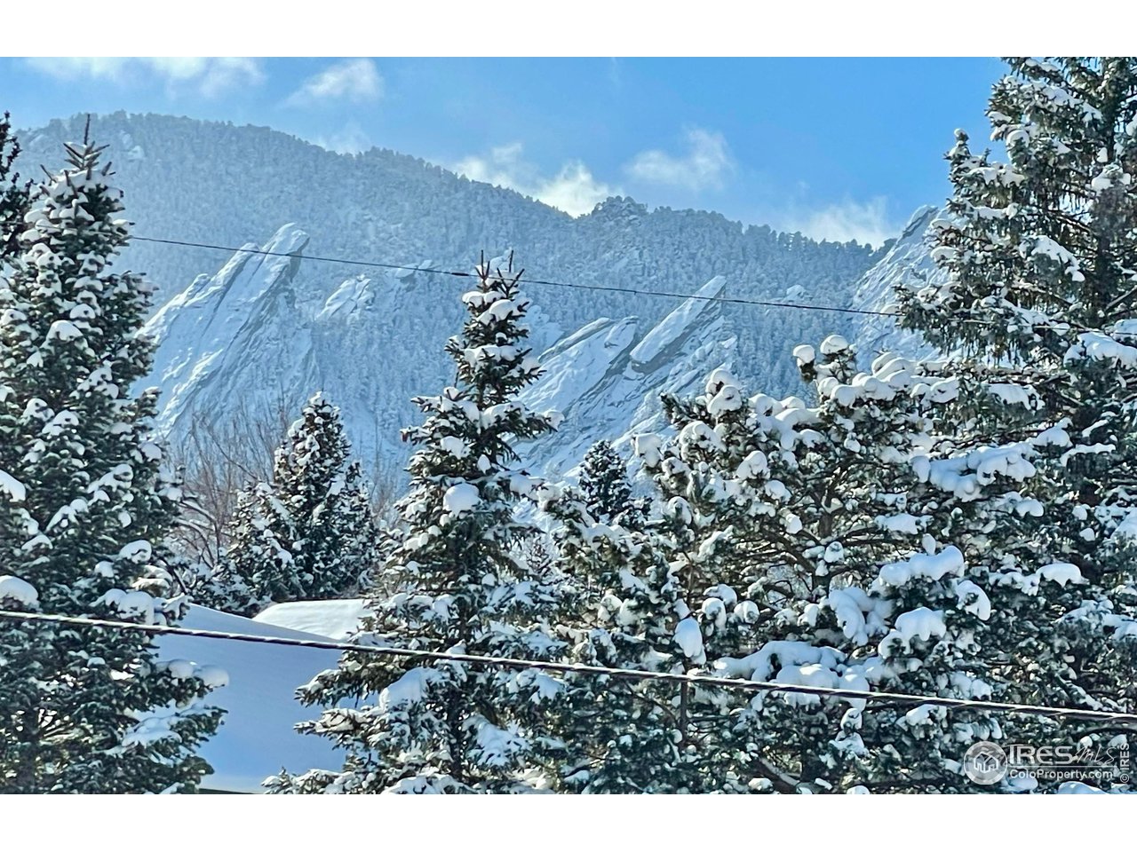 707 14th Street Boulder, CO 80302 - Photo 24 of 40 View from primary bathroom and private balcony with first snow of '25