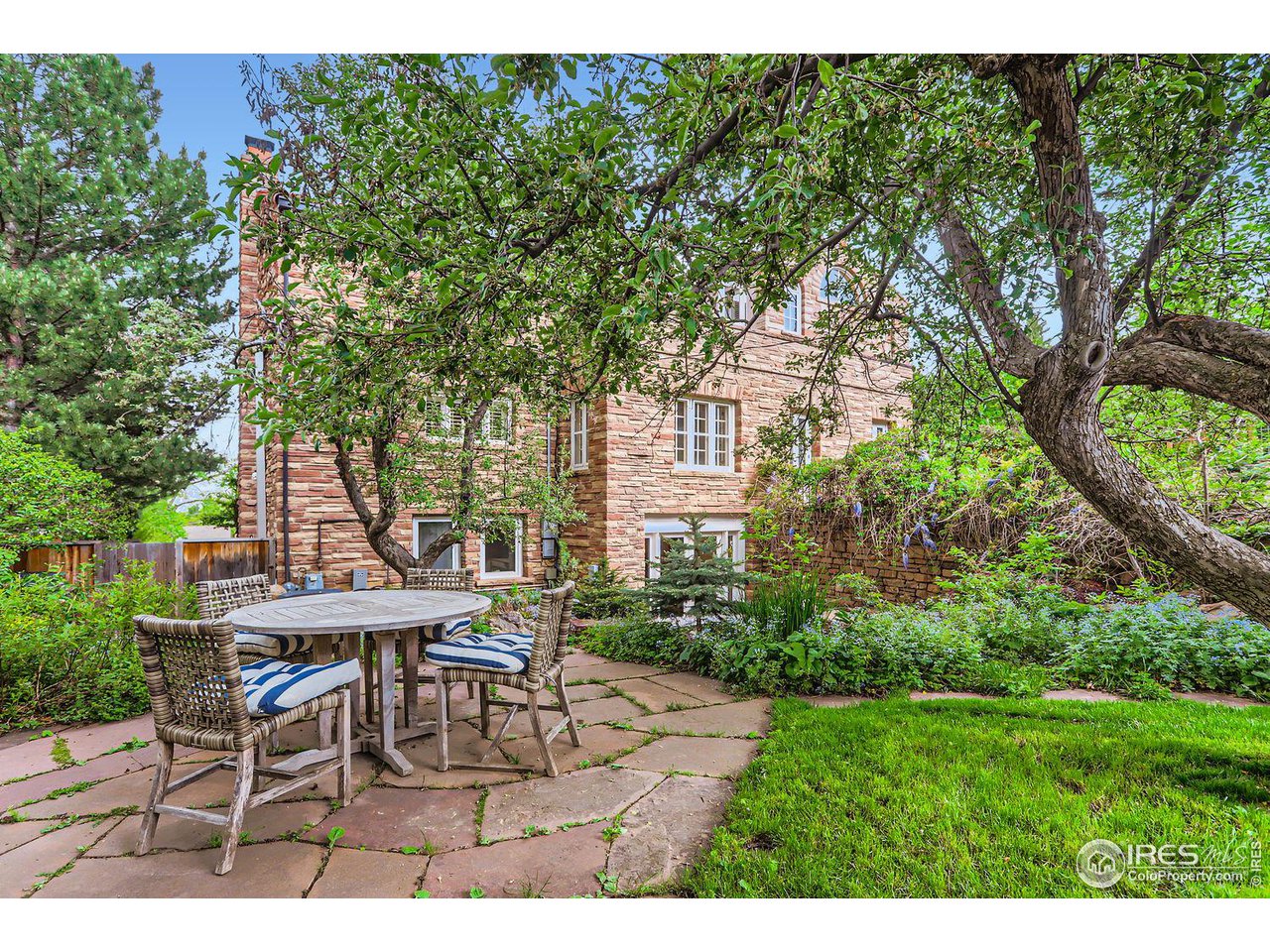 707 14th Street Boulder, CO 80302 - Photo 31 of 40 Multiple al fresco dining spaces with the cascading water feature nearby