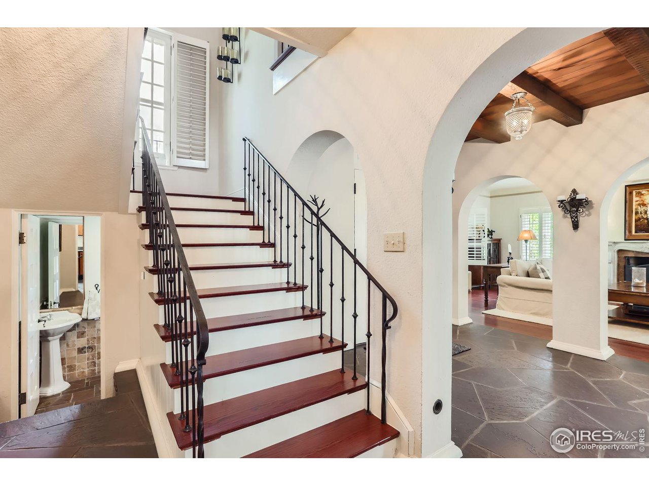 707 14th Street Boulder, CO 80302 - Photo 4 of 40 Incredible ironwork railings and sconces with wood beamed entry
