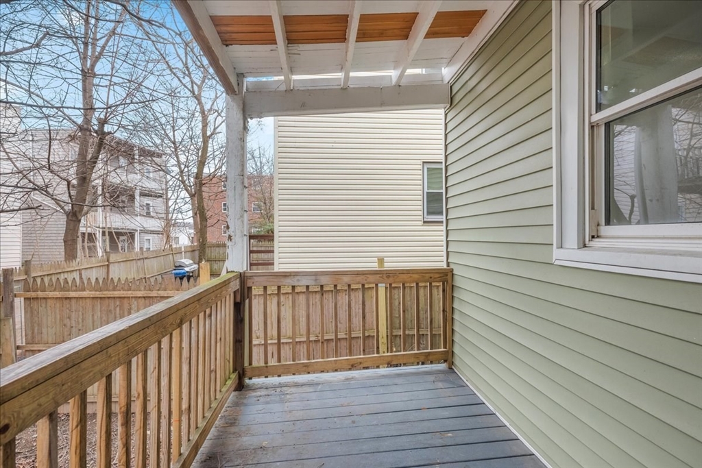 4 Bailey Street, Unit 1 Boston, MA 02124 - Photo 11 of 11 a view of a balcony with wooden floor