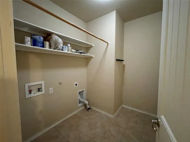 a view of a room with rack on the wall