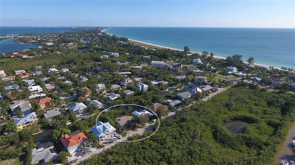 This fabulous home sits on a sailboat deep water canal out back and across the street from a preserved wet land that will never be built on out front. What a spot!
