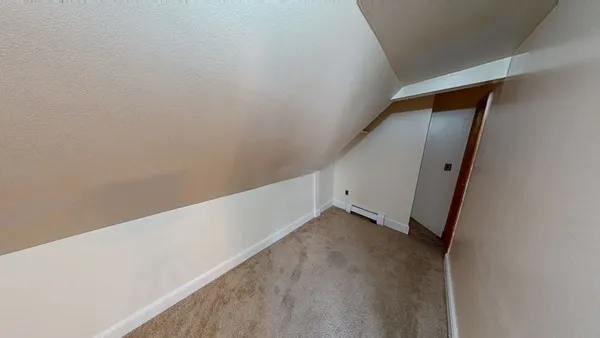 a view of a big room with stairs