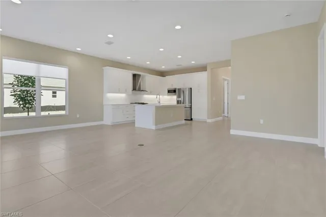 a view of a kitchen and a window