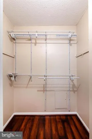 a view of a room with racks on the wall