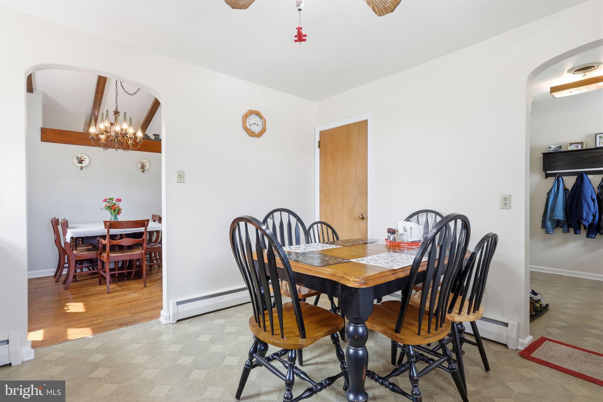 1413 Poplar Road Feasterville-Trevose, PA 19053 - Photo 12 of 35 a view of a dining room with furniture and wooden floor