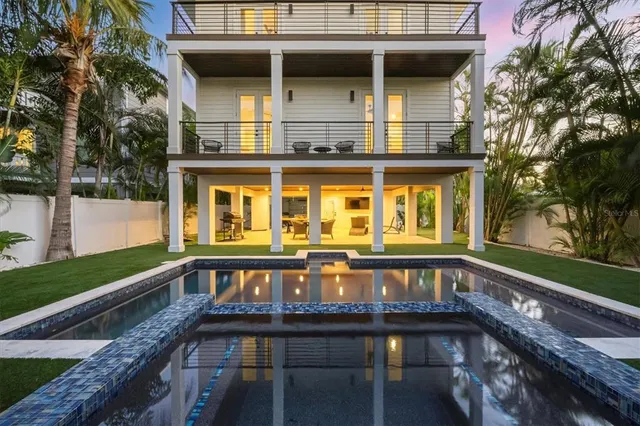 a view of a storage and utility room with washer and dryer