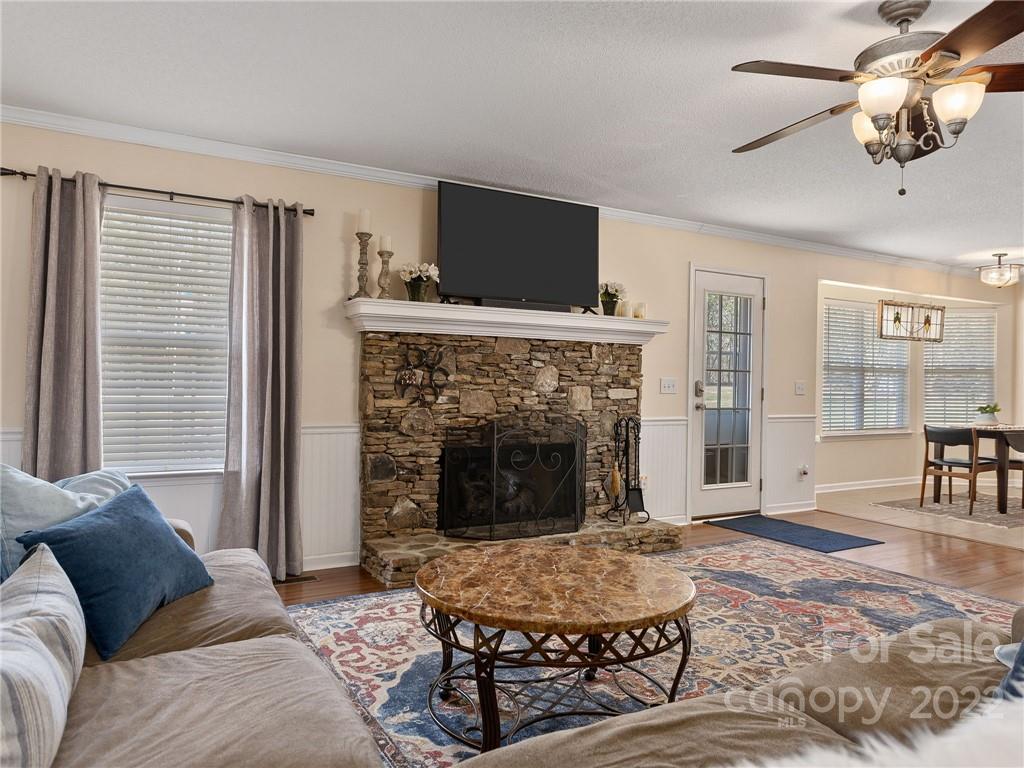 1085 Hooper Creek Road Tryon, NC 28782 - Photo 11 of 34 a living room with furniture and a fireplace