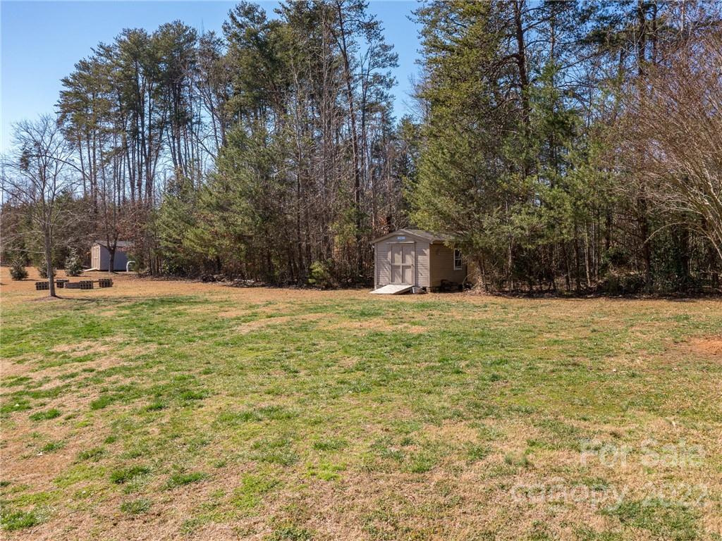 1085 Hooper Creek Road Tryon, NC 28782 - Photo 31 of 34 a house view with swimming pool