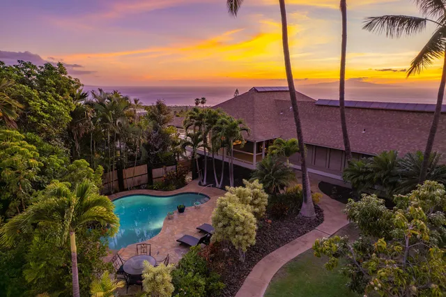 a view of a balcony with chairs