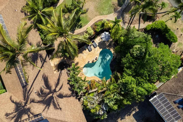 a backyard of a house with lots of green space