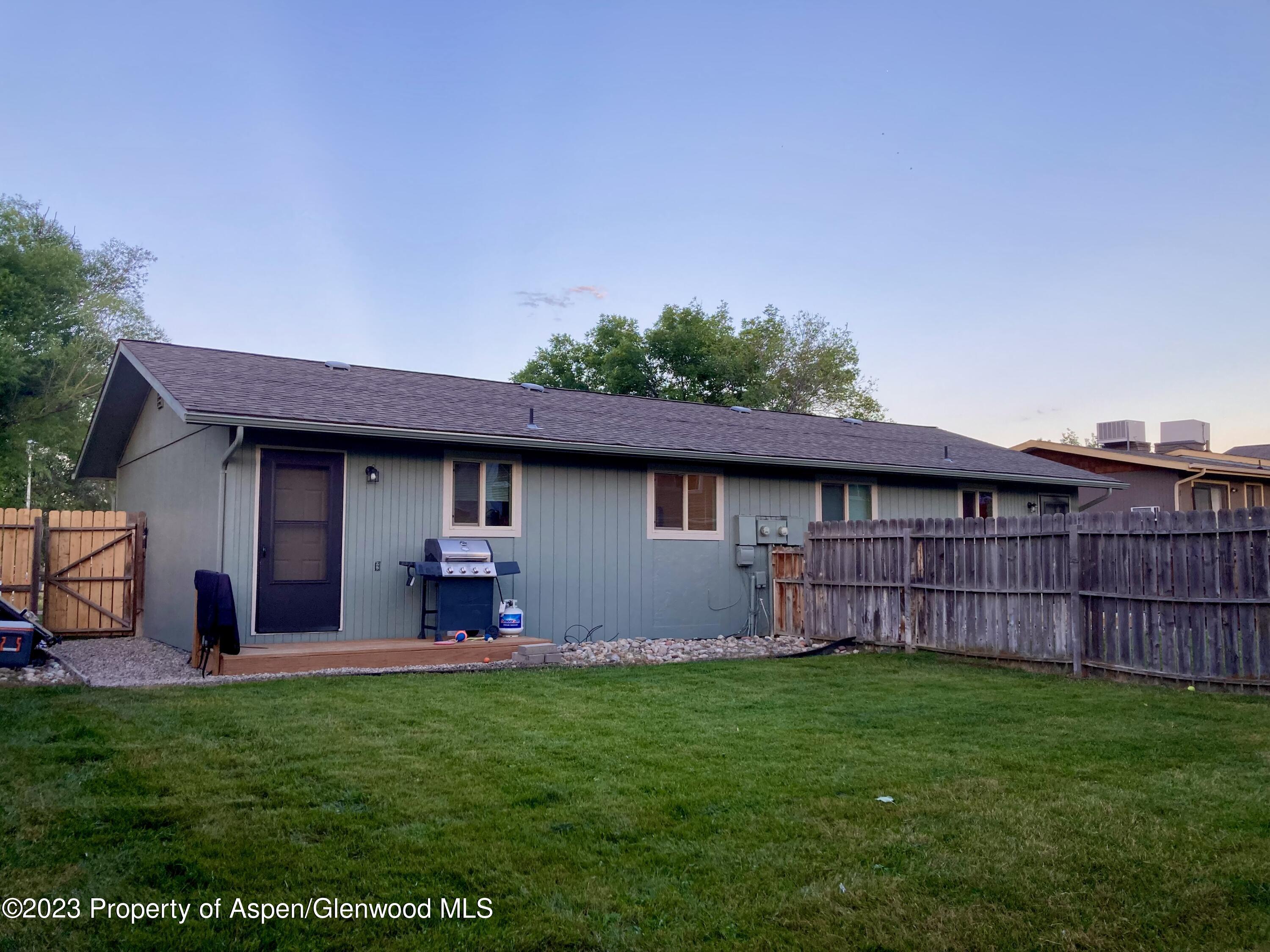2415 West Avenue Rifle, CO 81650 - Photo 4 of 9 a house view with a garden space