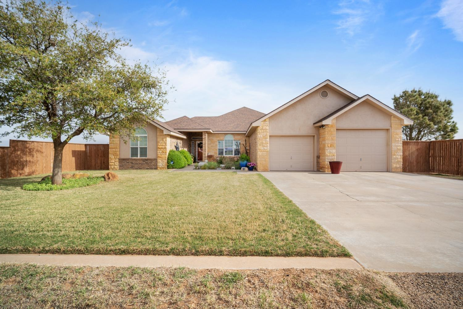 6487 East Fm 41 Ropesville, TX 79358 - Photo 1 of 33 a front view of a house with a garden