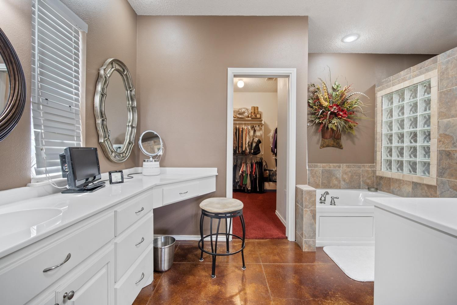 6487 East Fm 41 Ropesville, TX 79358 - Photo 12 of 33 a spacious bathroom with a sink a mirror and a bathtub