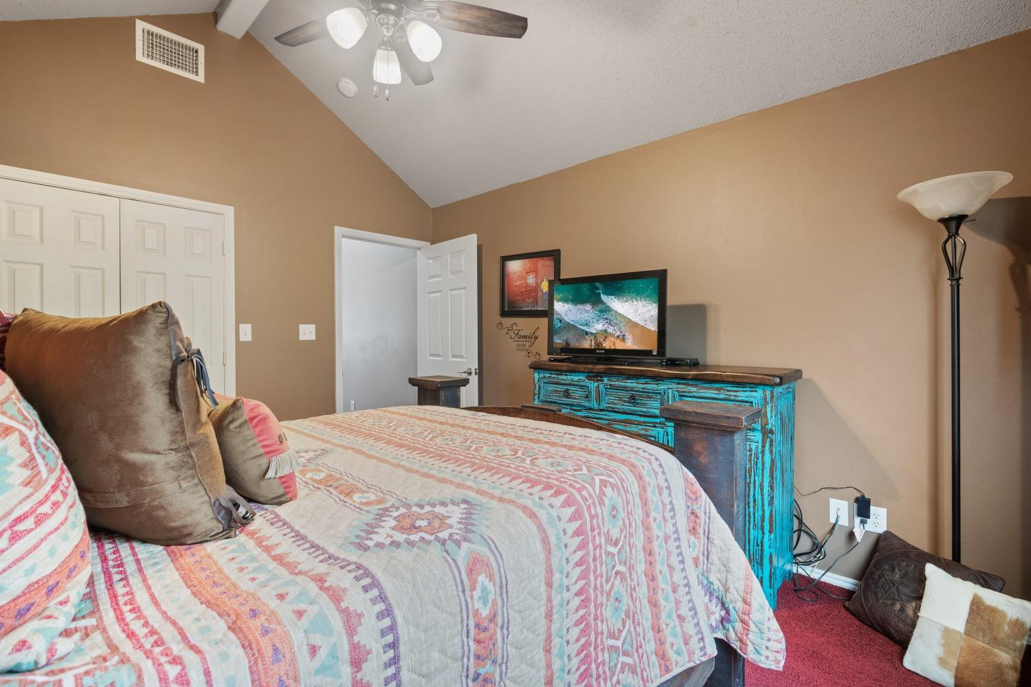 6487 East Fm 41 Ropesville, TX 79358 - Photo 18 of 33 a bedroom with a bed and a flat screen tv