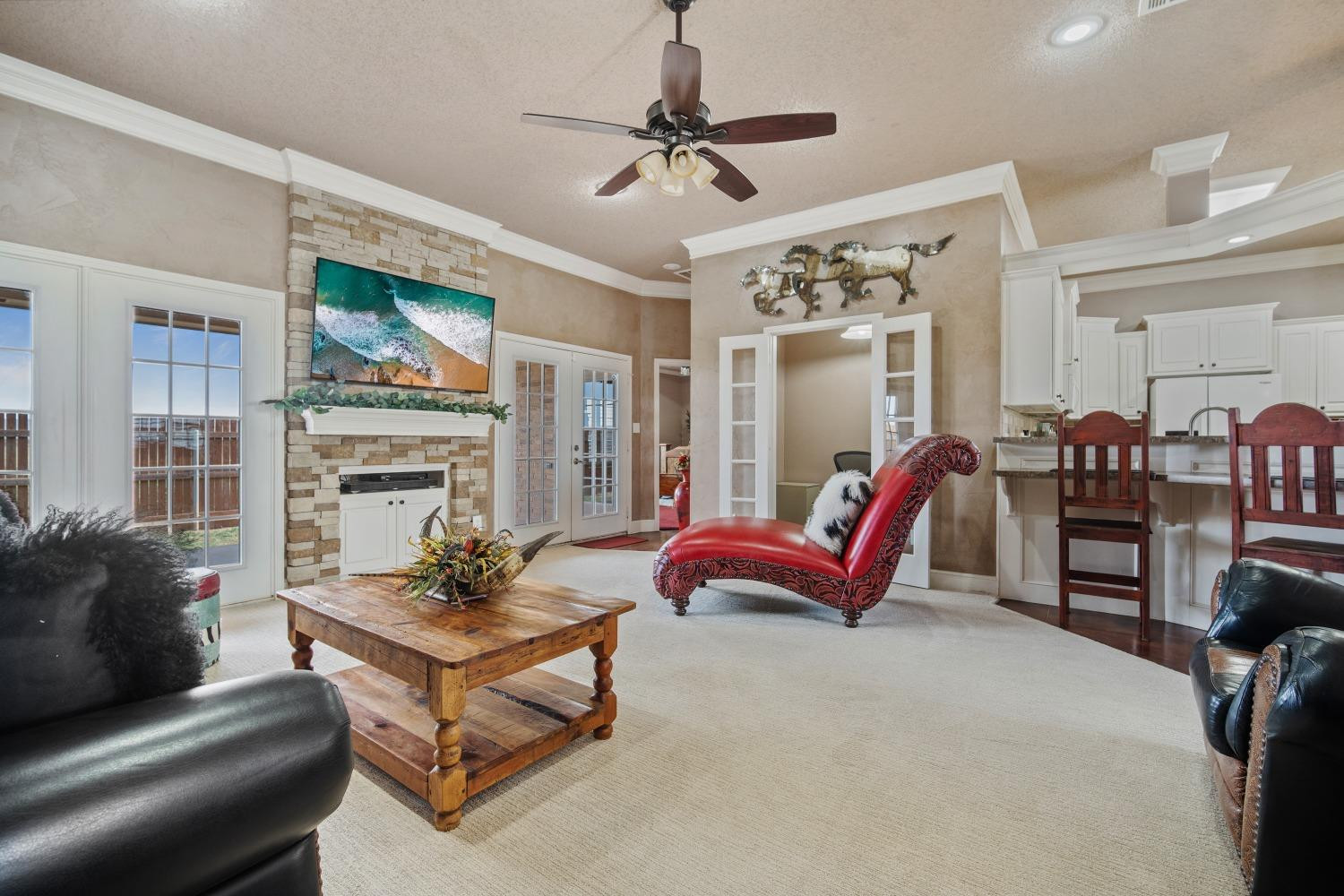 6487 East Fm 41 Ropesville, TX 79358 - Photo 7 of 33 a living room with furniture a fireplace and a chandelier