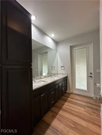 a workspace with furniture and wooden floor