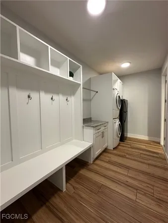 a large kitchen with stainless steel appliances kitchen island granite countertop a large counter top and stove top oven